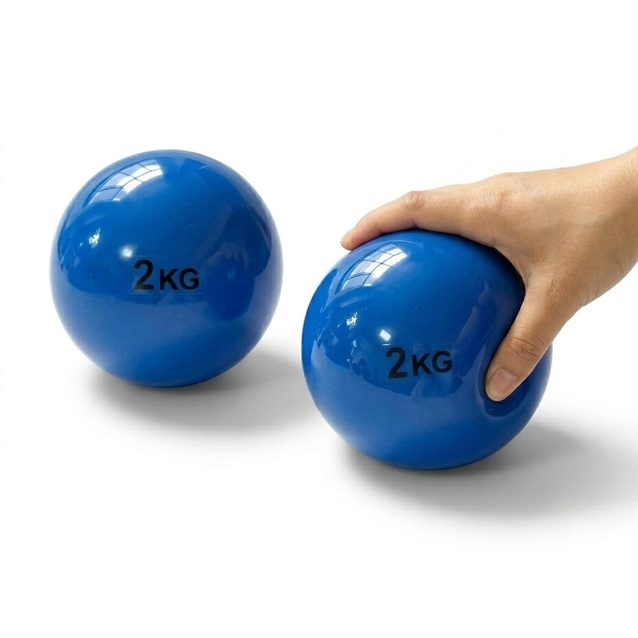 Safe PVC Practice. Blue soft shell PVC indoor shot put ball with 2KG weight label being squeezed to show pliable safety texture for school training, manufactured by source factory.